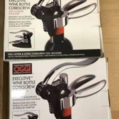 2 corkscrews with stand