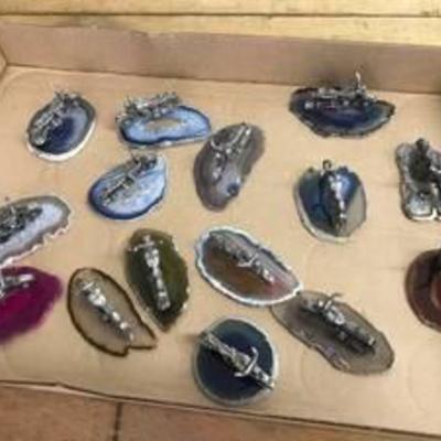 15 motorcycles on geode slabs, very small figurines