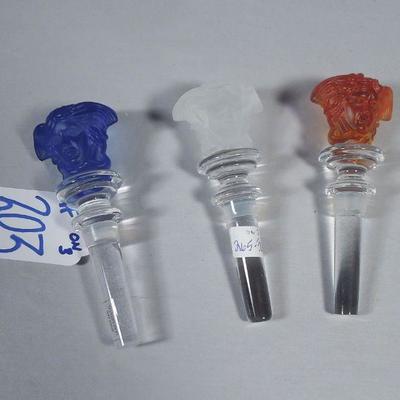 Three Rosenthal Versace crystal wine stoppers