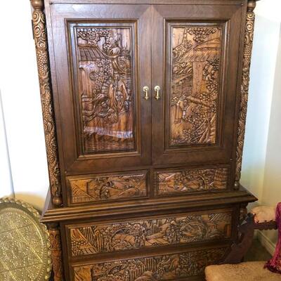 Detailed ha d carved armoire 