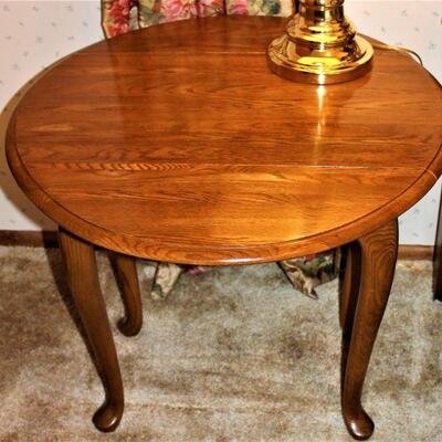 Drop leaf wooden side tables.
