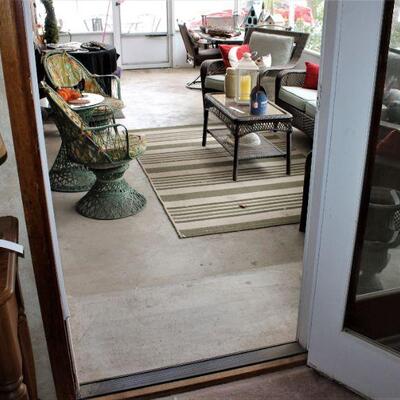 Lots and lots of outdoor furniture, pots, bird baths and decor.