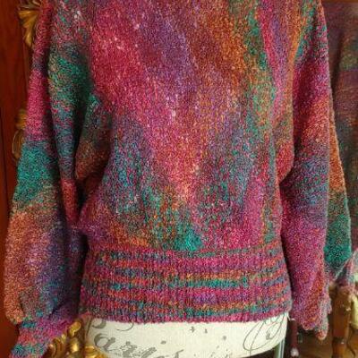 tons of sweaters from the 50s-80s