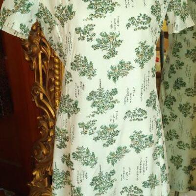 large collection of Asian brocade dresses, Cheongsams, robes and jackets