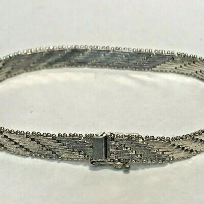 https://www.ebay.com/itm/124408706397	WL170 STERLING SILVER BRACELET WITH BOX CLASP 		 Auction 
