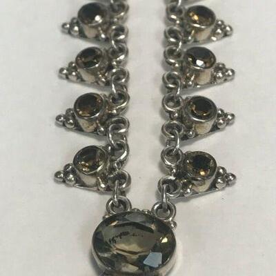 https://www.ebay.com/itm/114473620943	WL165 STERLING SILVER MULTIPLE TRIANGLES SMOKEY QUARTZ TYPE STONE NECKLACE			Buy-It-Now	 $75.00 
