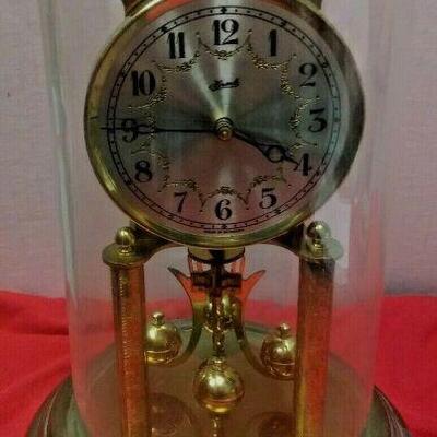 https://www.ebay.com/itm/124377648258	LX3031 10 INCH HIGH USED VINTAGE HERMLE WIND UP BRASS CLOCK WITH GLASS DOME 		 $23.00 	 Buy-It-Now 
