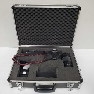 1424	

Canon EOS Rebel T2i Camera, 2 Canon Lens, Battery Charger, and More!
Canon EOS Rebel T2i Camera, 2 Canon Lens, Battery Charger,...