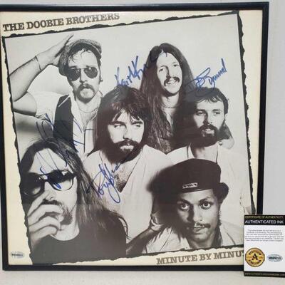 1012	

Framed The Doobie Brothers Signed Vinyl Record Album with COA
Includes Authenticated Ink COA Cert No: M600911 Measures approx...