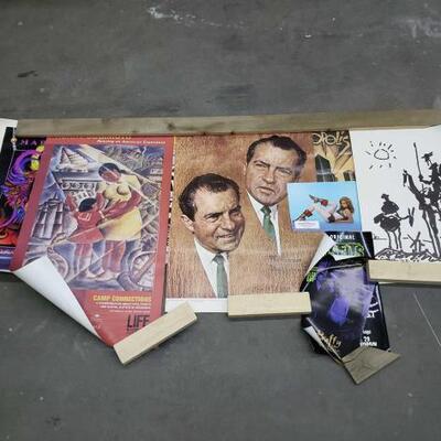 1454	

11 Movie, Rock Band, And TV Show Posters
Ranging In Size From: 47" x 27" - 8" x 6"