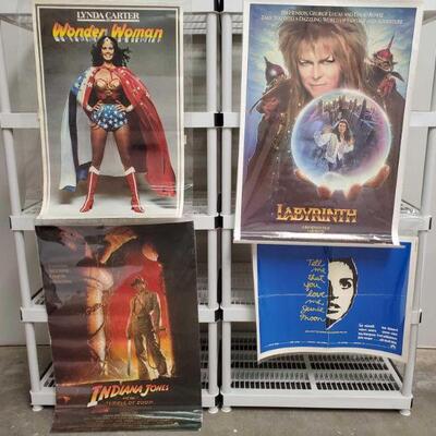 1100	

Labyrinth, Wonder Woman, Indiana Jones, And Tell Me You Love Me Junie Moon Movie Posters
Indiana Jones Measures 40"x27"...