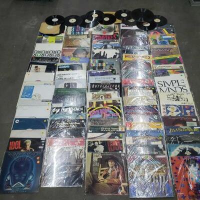 2000	

Vintage Record Collection From Artist Billy Idol, Choir Boys, Simple Minds, John Cougar, David Allan Coe and More
Multiple Acetate...