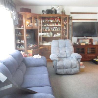 Another 3 piece cabinet, sofa ........