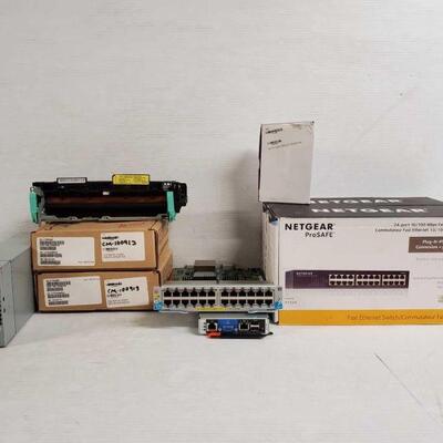 #5210 â€¢ 2 Netgear 24 Port 10/100 Mbps Switch, Hp Zl Module, Advanced Management Module And More