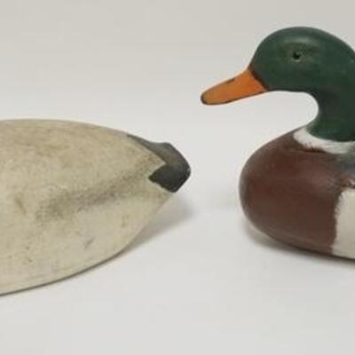 1003	2 CARVED WOOD DUCK DECOYS, LARGEST IS 16 IN X 8 1/4 IN

