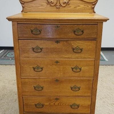1053	SOLID OAK 5 DRAWER CHEST W/CARVED SPLASH, 36 IN X 21 IN X 61 IN
