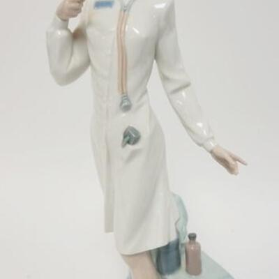 1037	LLADRO FEMALE NURSE/DOCTOR READING TEMPERATURE, 13 3/4 IN HIGH
