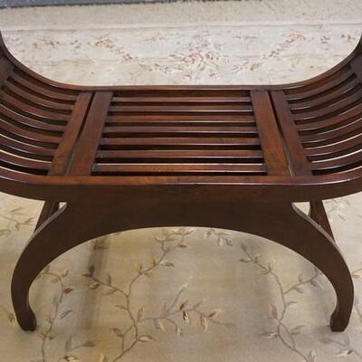 1059	CURVED BENCH, 32 IN WIDE X 13 1/2 IN DEEP X 24 1/2 IN HIGH
