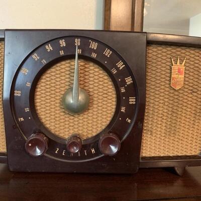 Vintage Zenith Electric AM FM Radio. Tested and works. Measures approximately 12 in x 7in x 7 1/2 in.