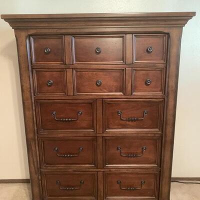 Chest of Drawers sold by Ashley Furniture. Measures 40 x 19 x 58 inches tall.