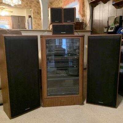 Technics Stereo System. Includes speakers and surround sound. All the cabinets are approximately 3 feet tall.