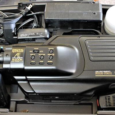 Large digital;, video camera.  Ready, set, film!