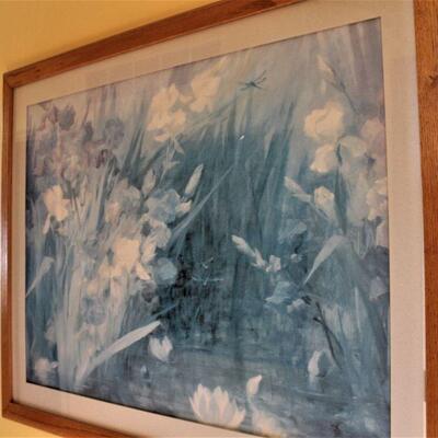 Large subdued floral artwork.