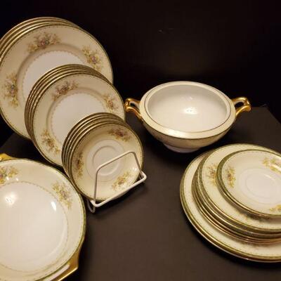 Meito floral china includes 7 dinner plates 10" 10 salad plates 8" 7 saucers 6" Serving bowl 9" Serving dish...