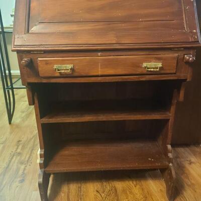 Writing desk is in decent condition. Measures 29" x 17" x 28â€, when extended 45"....