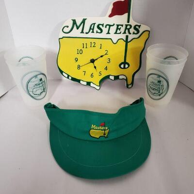 Masters wooden clock measures 10x10", Masters visor and 4 plastic cups from 2009 and 2010....