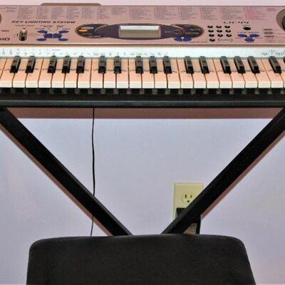 Casio electronic keyboard is ready to make you a star!  Includes stand and seat.