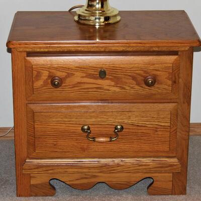 Two Bassett solid oak nightstands are in excellent condition.