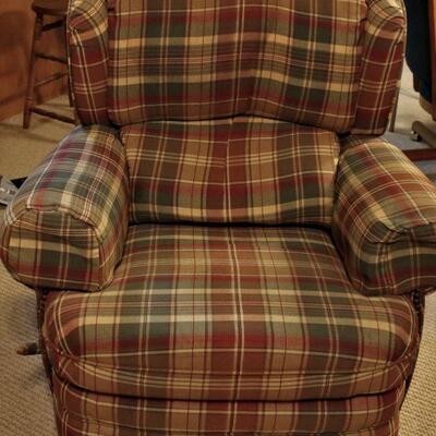 Sturdy and comfortable plaid recliner is also in great condition.