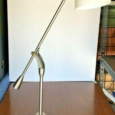 https://www.ebay.com/itm/124679333813	KG0080 SILVER DESK LAMP WITH ADJUSTABLE ARM		Buy-It-Now	 $19.99 
