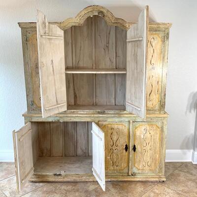 Hand painted distressed 2PC imported cabinet. Bottom piece measures 72" wide and 36.5" high. Top piece measures 69" wide...