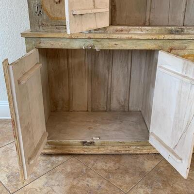 Hand painted distressed 2PC imported cabinet. Bottom piece measures 72" wide and 36.5" high. Top piece measures 69" wide...