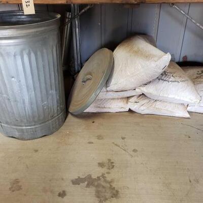 1038	

Pellets
6 Bags Of Wood Pellets & Metal Trash Can Full Of Pellets