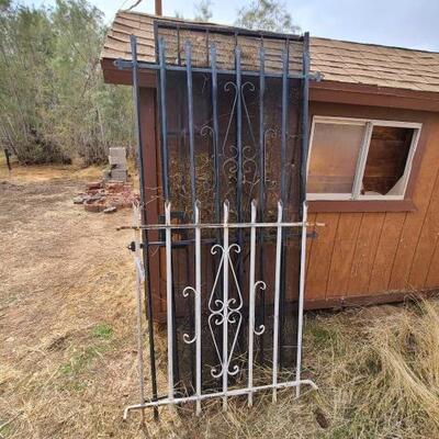 4002	

2 Peieces Of Rod Iron Fence And Metal Security Door
Door Measures Approx: 32" x 81" Rod Iron Ranges In Size From Approx:...