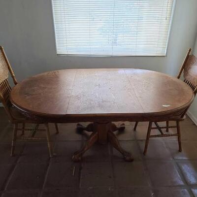 2208	

Dinning Room Table And 2 Chairs
Table Measures Approx: 71" x 47" x 30"