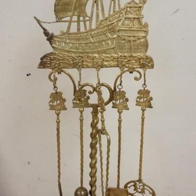 1093	CAST IRON SAILING SHIP FIREPLACE TOOL SET W/A ROPE TWISTED COLUMN & BASE, SHIP MARKED DON FERNANDO, 50 1/2 IN HIGH
