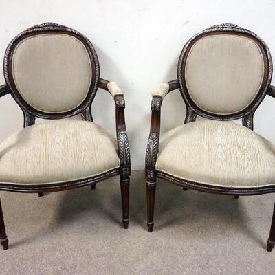 1022	PAIR OF MEDALION BACK ARM CHAIRS W/ CARVING & GILT SILVER ACCENTS
