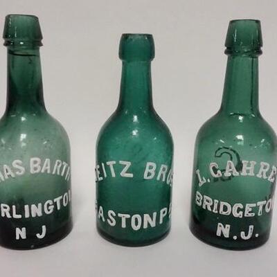 1035	LOT OF THREE DARK GREEN BEER BOTTLES INCLUDING; SEITZ, EASTON, BARTH, BURLINGTON NJ, GAHRE, & BRIDGTON, NJ, 
