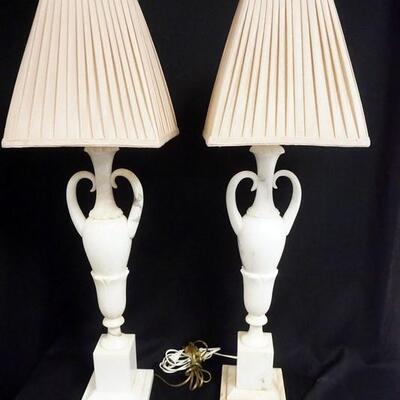 1023	PAIR OF MARBLE DOUBLE HANDLED URN FORM LAMPS. 36 IN H 
