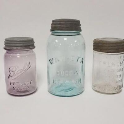 1029	FIVE CANNING JARS INCLUDING FRENCH'S MUSTARD WANETA COCOA, 4 W/ ZINC LIDS ONE W/ GLASS LID TALLEST IS 7 IN 

