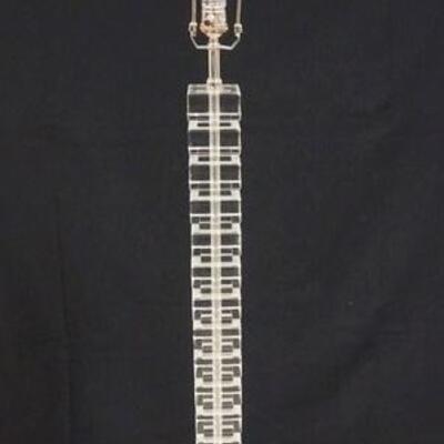 1050	RESTORATION HARDWARE STACKED CRYSTAL BLOCK FLOOR LAMP. LAMP IS 5 FT HIGH W/ POLISHED NICKEL BASE
