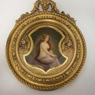 1001	SIGNED HAND PAINTED PARTIAL NUDE DRESDAN PLATE IN AN ORNATE GILT FRAME. 9 IN DIAMETER
