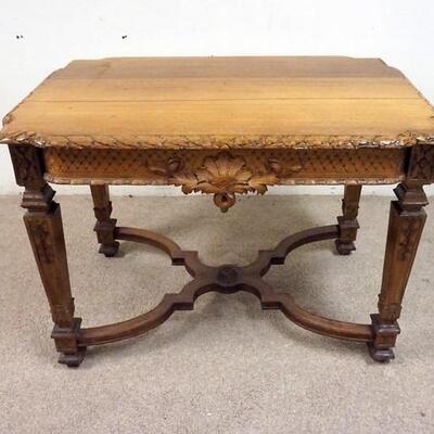 1013	WALNUT TABLE W/ CARVED SKIRTING LEGS. 41 IN X 41 IN, 29 IN H 
