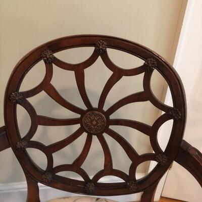 VINTAGE WHELL BACK CHAIRS.  UNIQUE AND IN GREAT CONDITION.