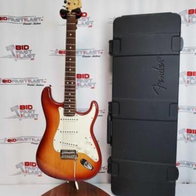2038	

Fender Stratocaster Electric Guitar With Hard Case
Serial Number: Z8094684