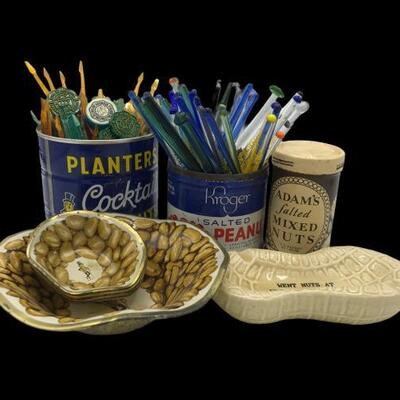This lot contains peanut themed memorabilia that includes a vintage Planter's can, Adam's Mixed Nuts and Kroger's nuts....